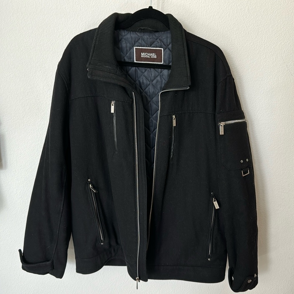 Michael Kors Men’s Size L Black Jacket with zipper details.